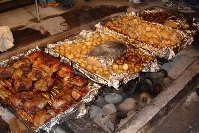 Image of food that has been cooked on hot coals in a traditional Maori Hangi