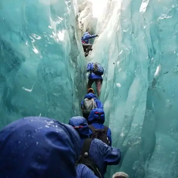 Image of a group being guided up on the Franz Josef Glacier