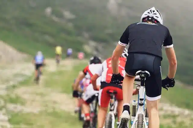 Motatapu Mountain bike race - line of bikers going downhill