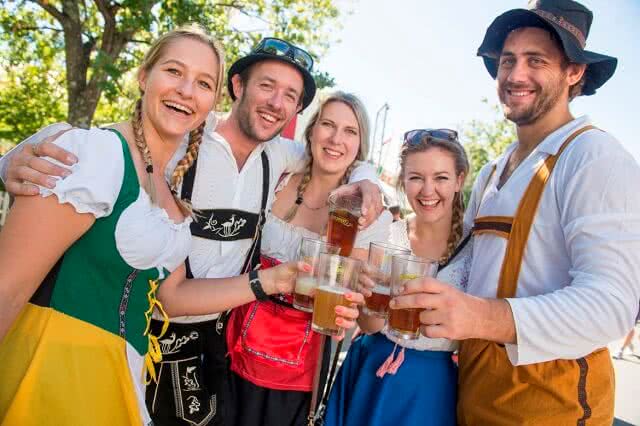 Image of people enjoying the beer and sun at Marchfest