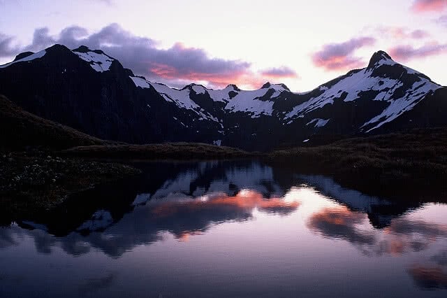 Image looking towards Mount Ernot and Jervois Glacier at sunset on the Milford Track - one of New Zealand's Great Walks