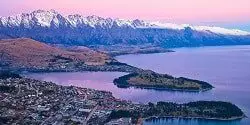 Image looking down on Queenstown and Lake Wakatipu from the top of the Skyline Gondola as dusk