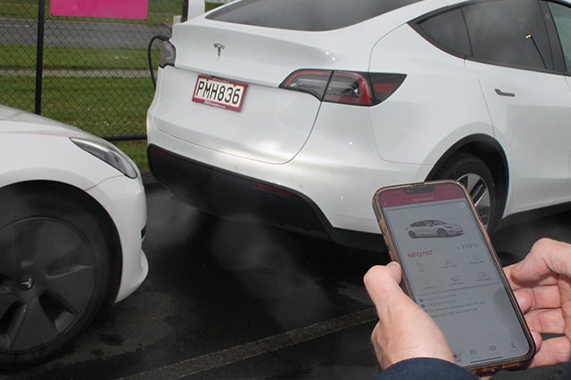 GO Rentals app with the Tesla electric car