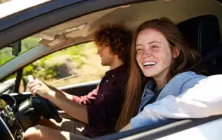 Two people inside a car