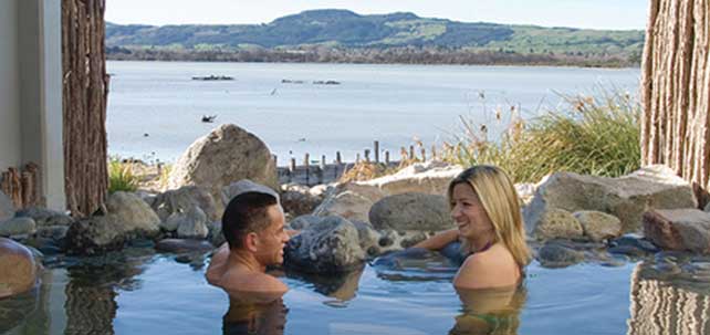 Image of two people enjoying the Polynesian Spa in Rotorua